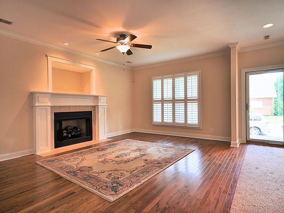 Large living room with hardwood floors. 