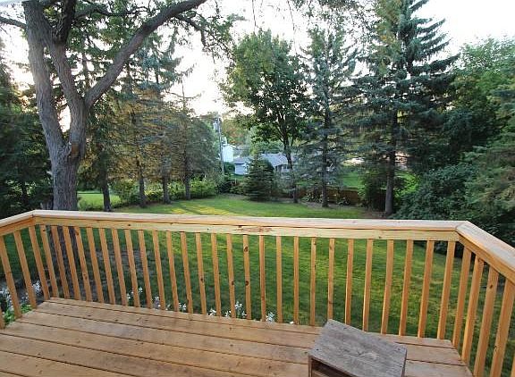 Nice size deck to entertain on and enjoy the private backyard that adjoins with a park.