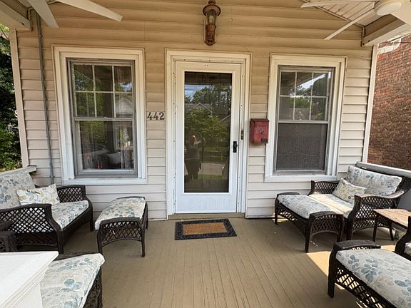 front porch with 2 ceiling fan