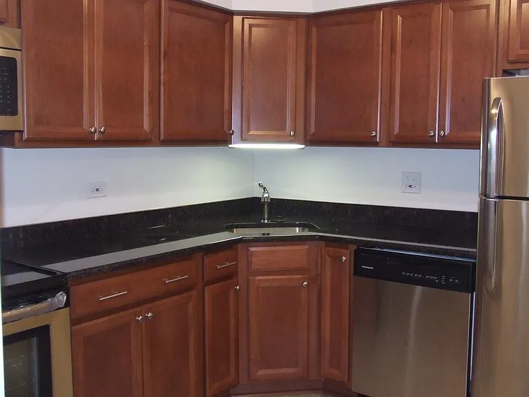 Kitchen with maple cabinets and granite countertops