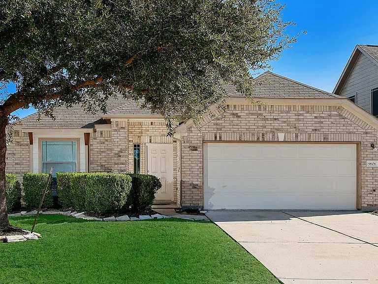 9606 Arched Oak Dr — Photo 1