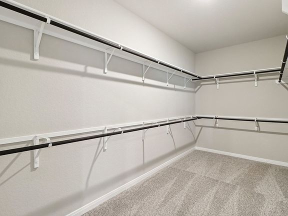 Primary Suite Walk-In Closet