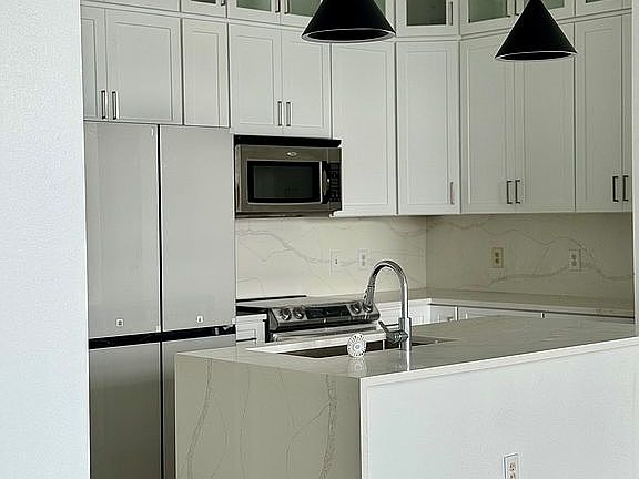 3rd image of 711 Cosmopolitan Dr NE Unit 815
