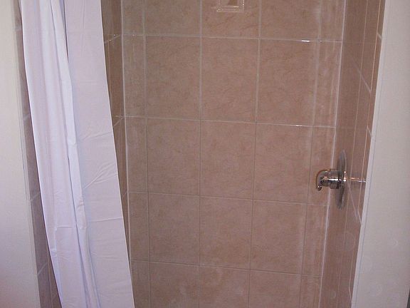 rear unit ceramic tiled shower