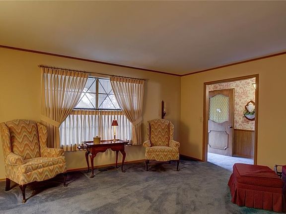 This view is of the the living room looking back toward the entry and the front door.
