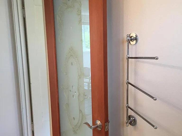Bathroom, looking out to hallway & bedroom #2