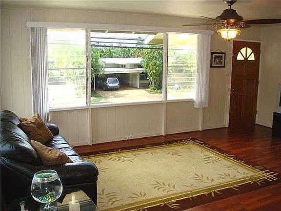 Large living room with newly install laminated flooring