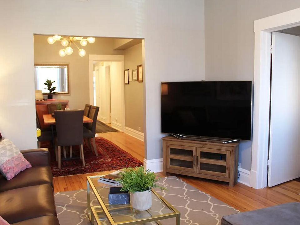 living room. 60 inch samsung smart LED tv. Sony smart blu ray player.