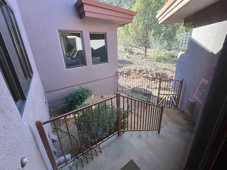 Small Outdoor Area off the Upper Kitchen Hallway to Master Suite 1