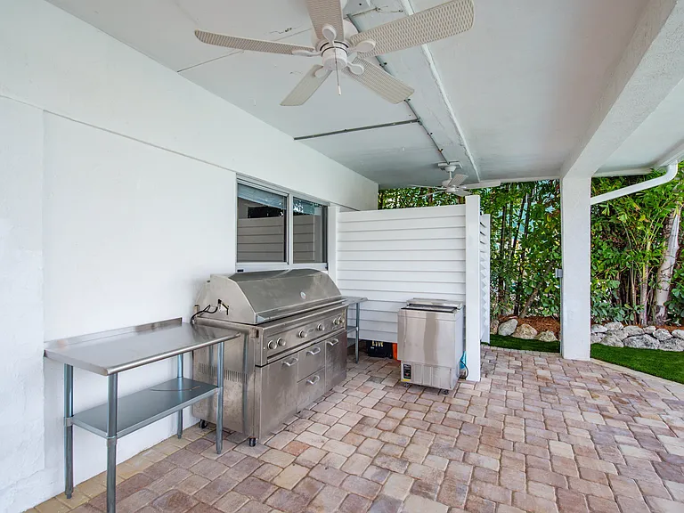 Grilling up the days catch poolside.