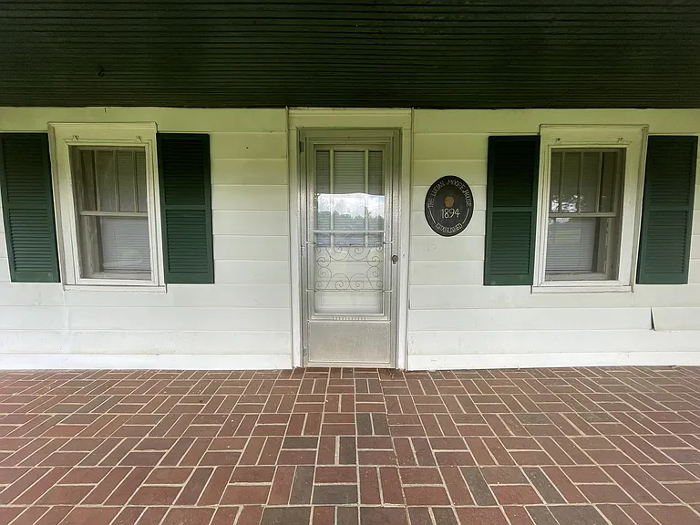 Broad front porch, perfect for rocking chairs and gliders.