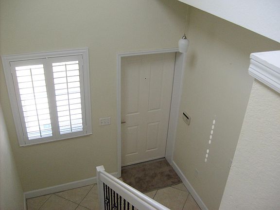 Foyer has a large coat and shoes closet.