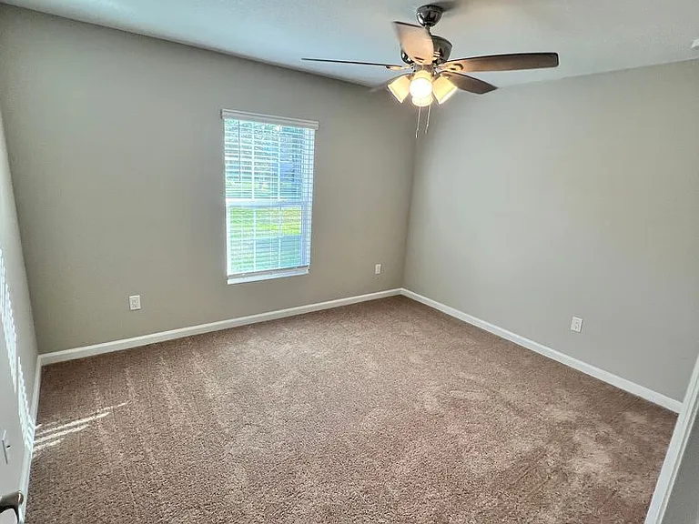 5951 NW Baynard Dr — Photo 34