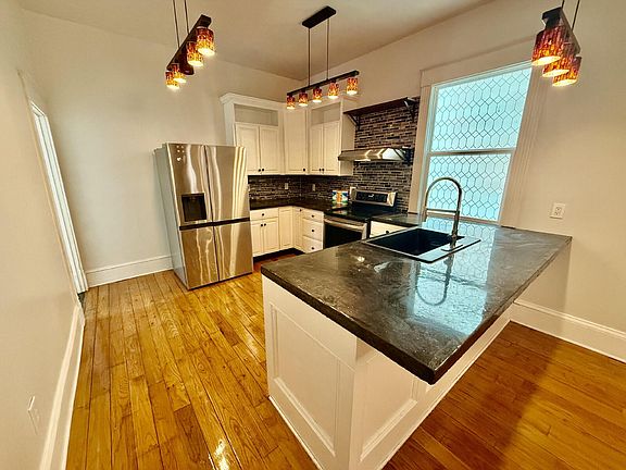 3rd image of 311 E 5th St