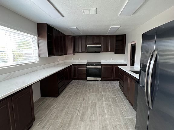 #GuardianRealty 295 N Phyllis St RV Parking Rental kitchen_10082024