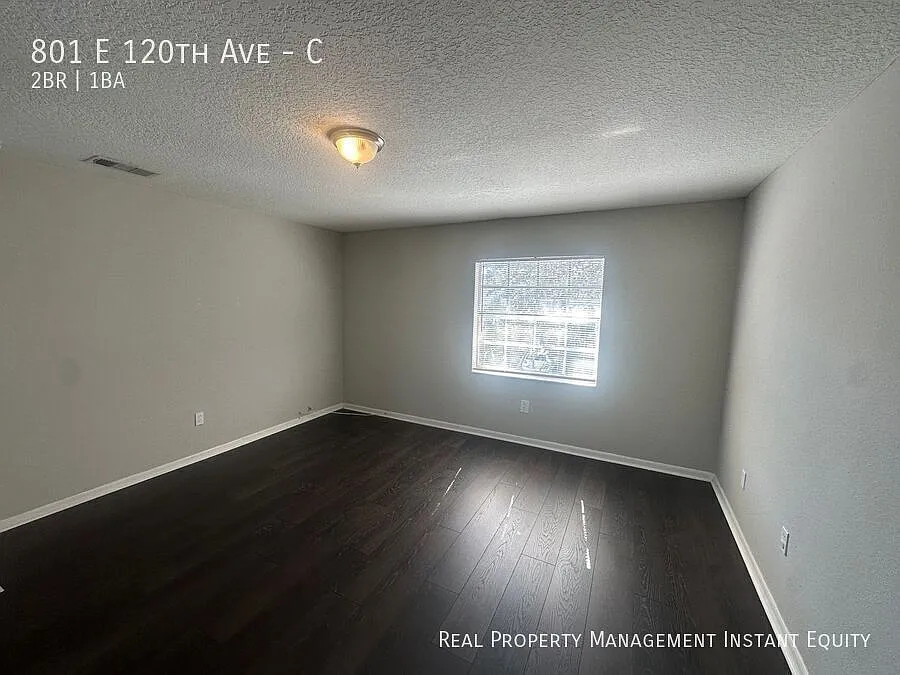 Building Photo - 801 E 120th Ave #C