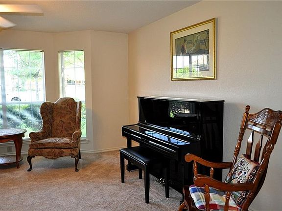 This large living area allows for a variety of furniture placement, flows into the formal dining. Enjoy the daylight.