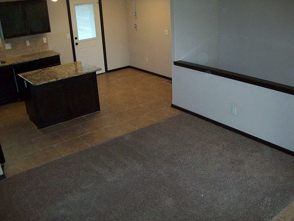 Living Room, Kitchen, & Dining Area