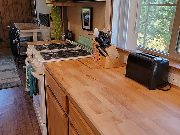 Galley Kitchen - range and built-in microwave