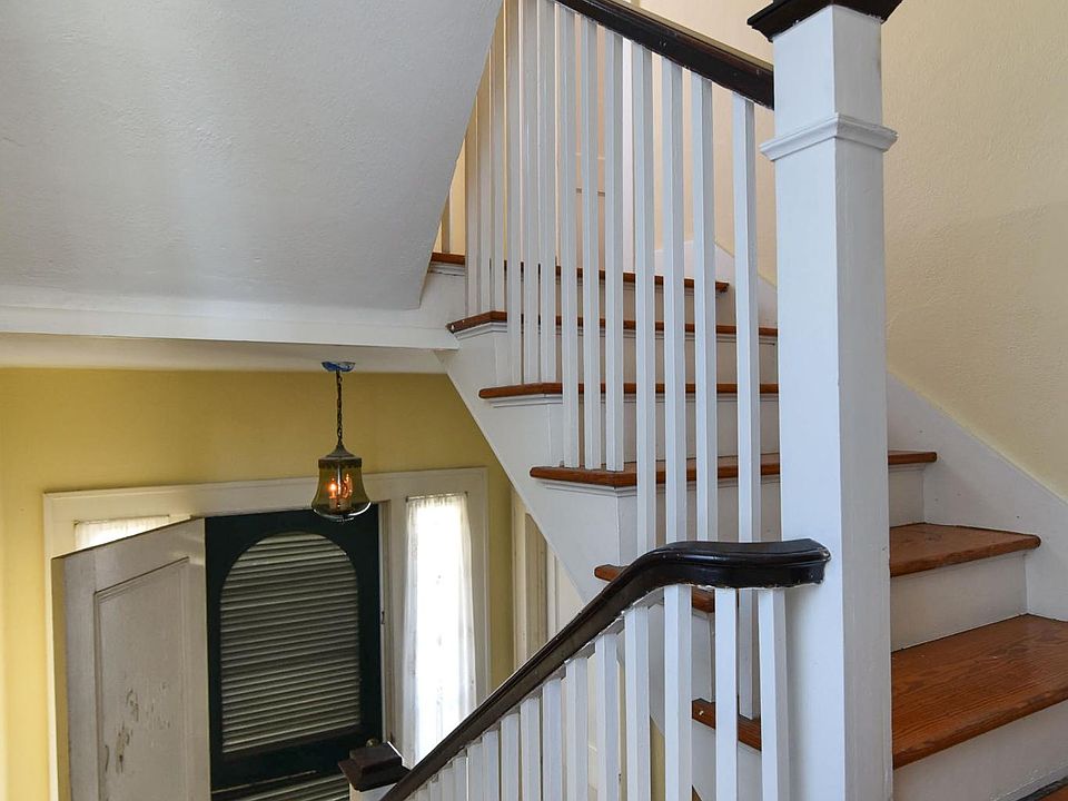 Hallway to upstairs apartment.