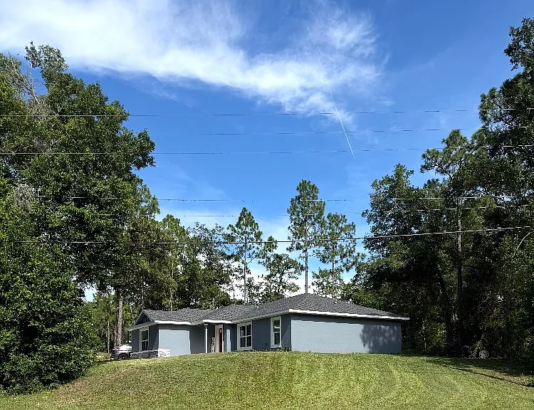 10448 N Athenia Dr — Photo 1