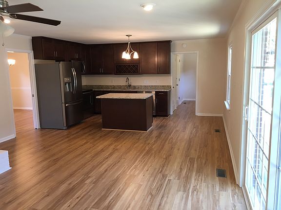 Den open to kitchen