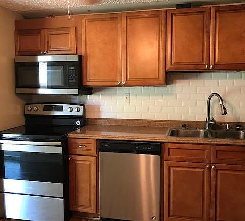 18 X 15 Kitchen with Stainless Appliances, newer cabinets and countertops.