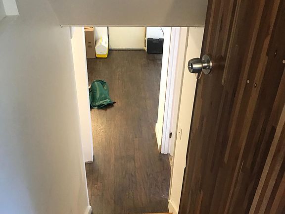 stairs to the basement, washer/dryer, and garage