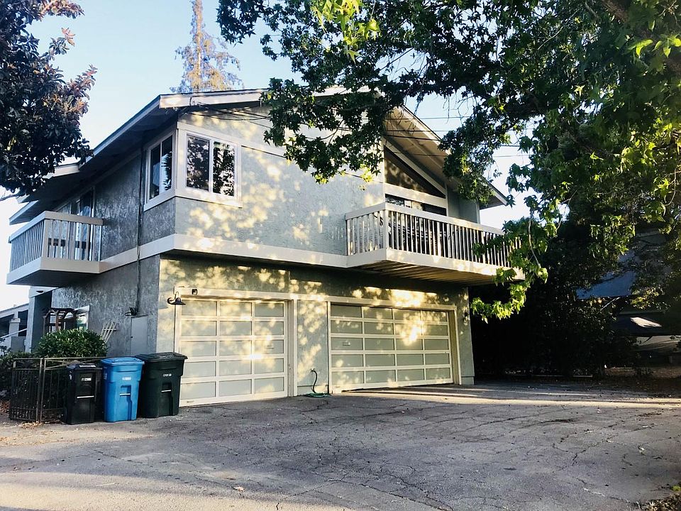 Second floor upper unit with two balconies , patio (not in pic) +one car private garage.