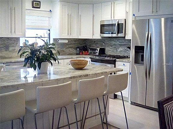 4th image of 5980 80th St N Unit 402
