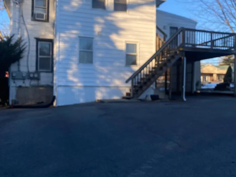 one vehicle parking under deck