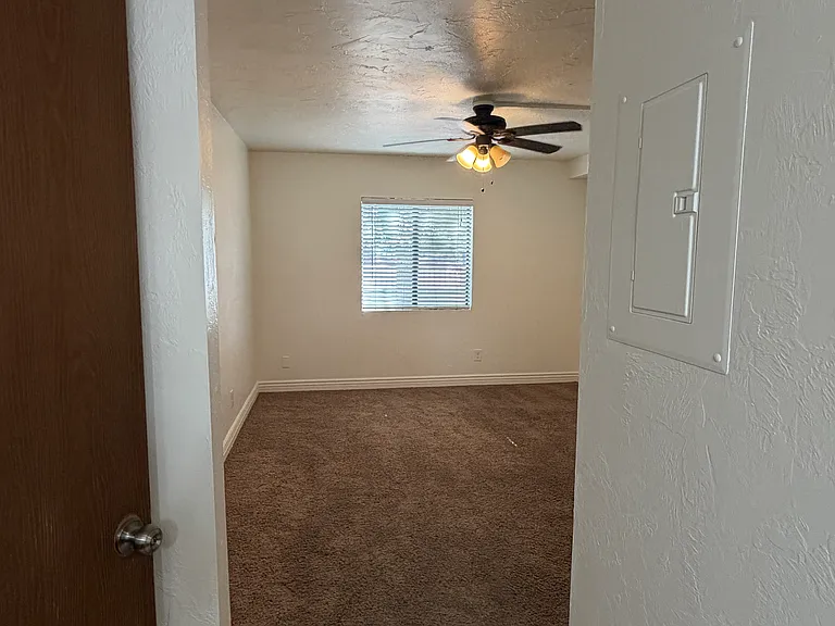 View from bathroom vanity into bedroom #1