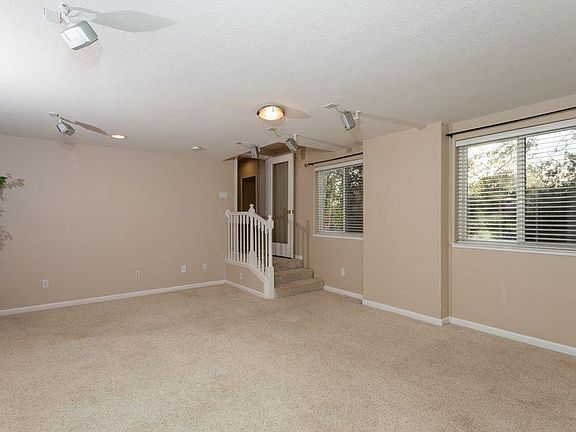 Great room which now has a new tile floor.
