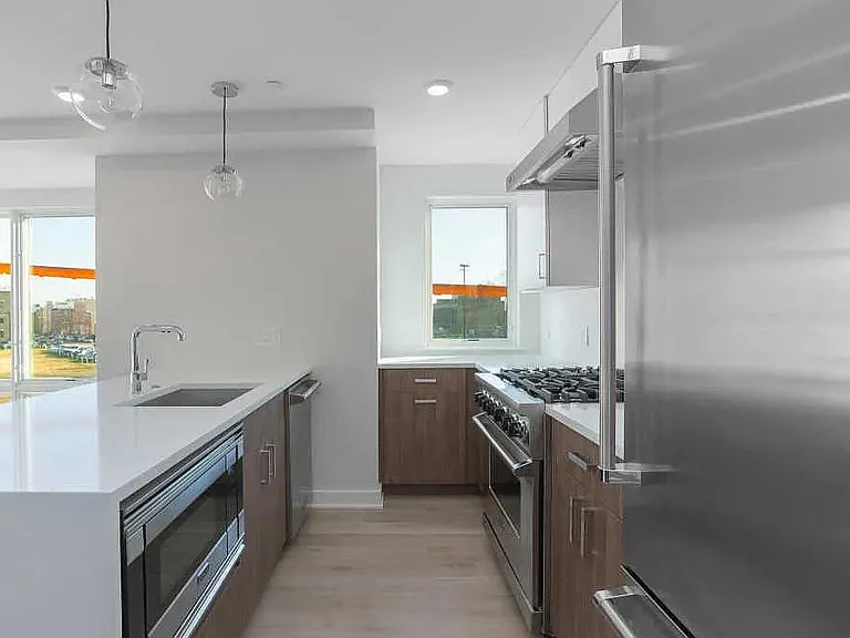 This is a well designed kitchen with upgraded Viking appliances and well designed exhausted hood.