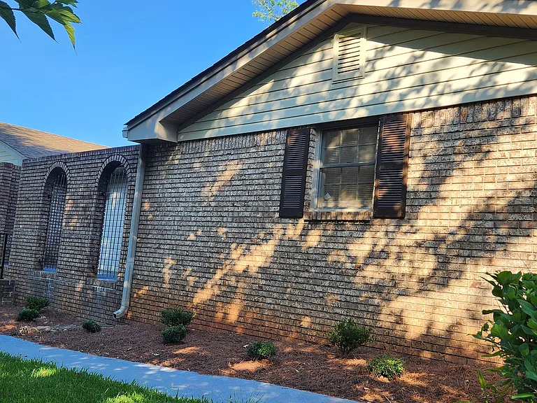 Spanish style brick home in a very quiet neighborhood. Large two-car attached garage and secluded front porch with sitting area.