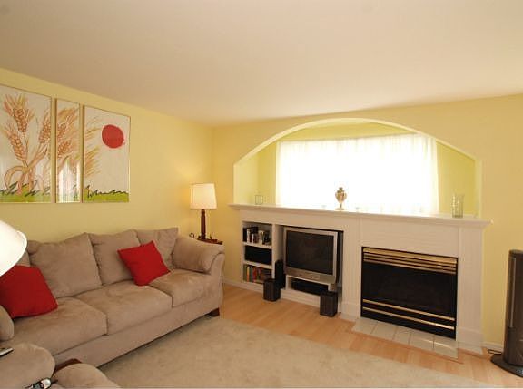 A cozy gas fireplace in the living room for those chilly winter nights. 