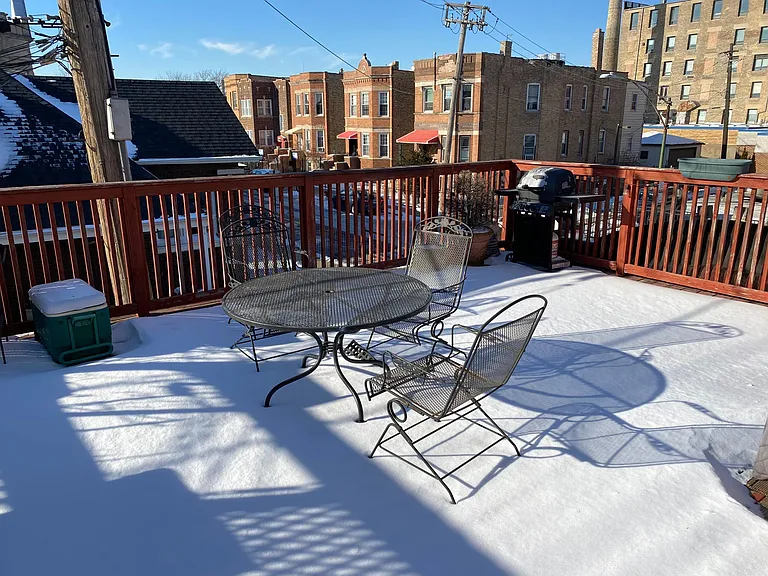Large deck area on the roof of the garage