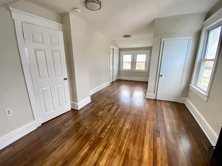 (second floor)top left bedroom 2 full size closets, hardwood floors, LED lights, plenty of windows. 10x17