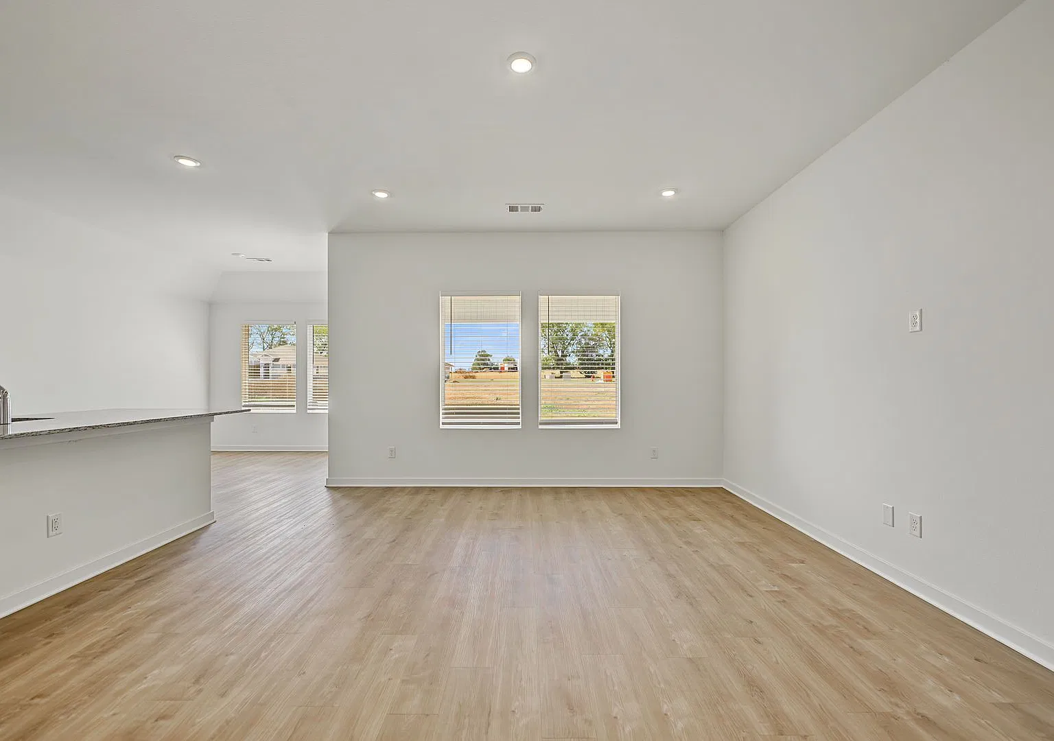 Light-Filled 4-Bedroom Home with Open Floor Plan — Photo 4