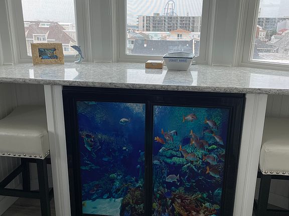Commercial sliding door fridge with "aquarium decal" on fridge doors!