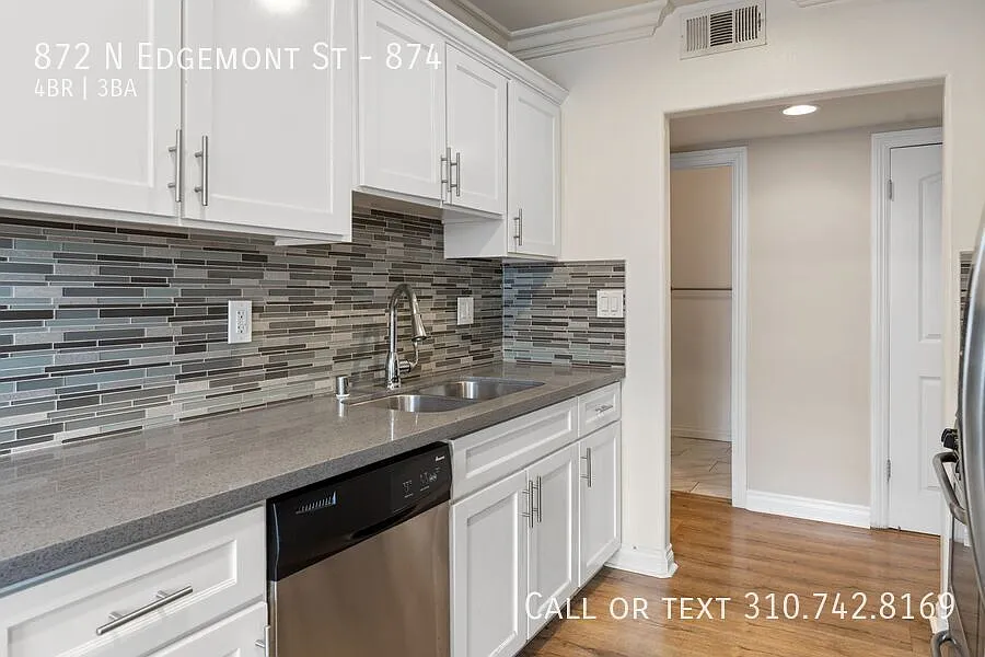 Spacious 4-Bed, 3-Bath House with 2 parking spots and W/D hookups — Photo 4