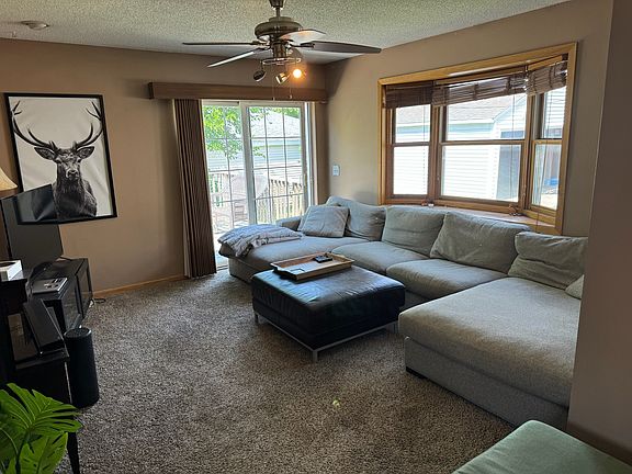 Back living room with walkout porch.