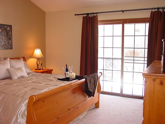 Master bedroom with walk out private deck