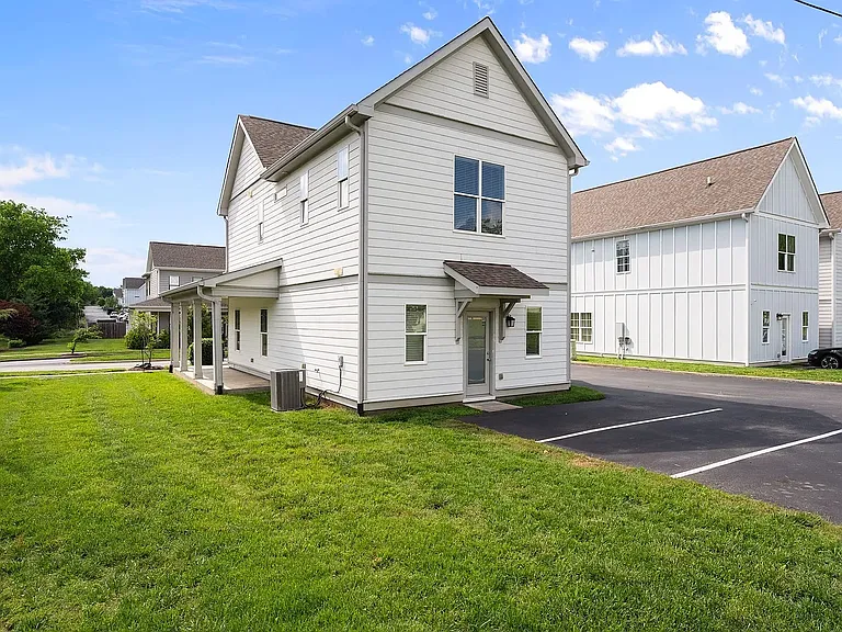 Behind the home are three parking spots. While these are not technically dedicated to this unit, other residents typically park closer to their homes.