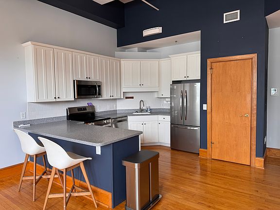 Less than 2 year old appliances. Glass top range, microwave over and french door refrigerator with slide out freezer.