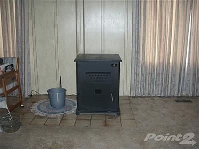 Warm this cozy home with this super efficient pellet stove, with thermostat and blower.