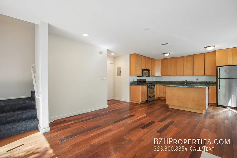 Bright Two-Story Townhome with Fireplace, Balcony & 2-Car Garage Parking — Photo 2