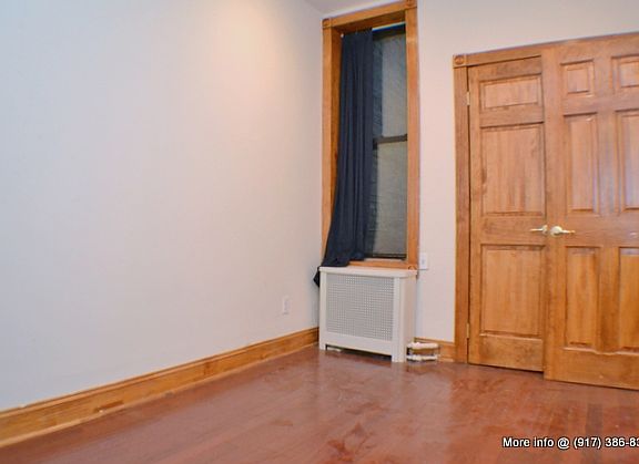 5th image of 201 E 10th St APT 9