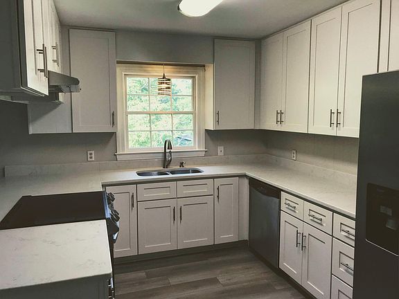 New kitchen cabinets, floor, stove.
Dishwasher and refrigerator included.