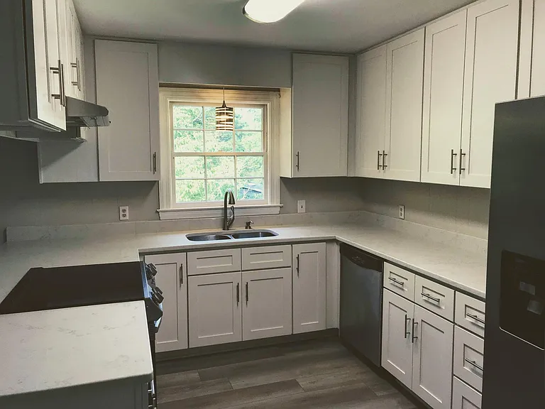 New kitchen cabinets, floor, stove.
Dishwasher and refrigerator included.